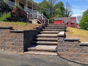 What is the Difference Between Block and Stone Retaining Wall Installation in West Caldwell, NJ?